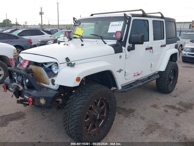 1C4BJWDG9EL161307 Jeep Wrangler Unlimited Freedom Edition