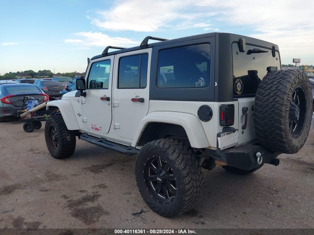 1C4BJWDG9EL161307 Jeep Wrangler Unlimited Freedom Edition