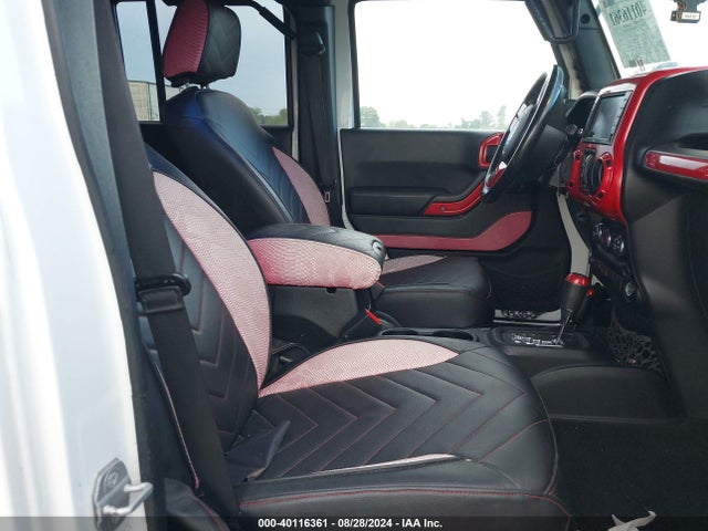 1C4BJWDG9EL161307 Jeep Wrangler Unlimited Freedom Edition