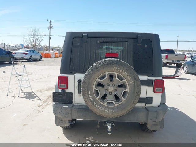 1C4HJWDG0FL597359 Jeep Wrangler Unlimited Sport