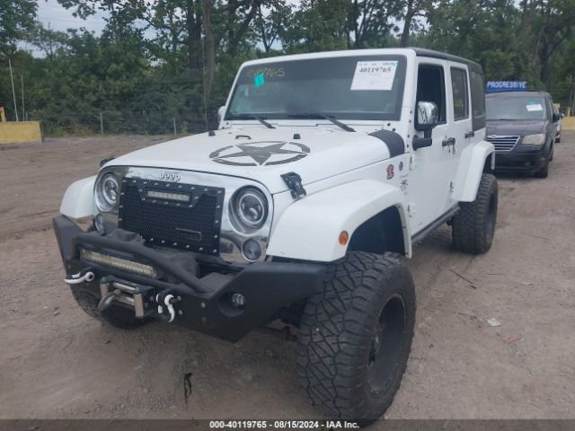 1C4BJWDG8EL307762 Jeep Wrangler Unlimited Sport
