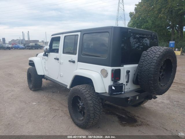 1C4BJWDG8EL307762 Jeep Wrangler Unlimited Sport