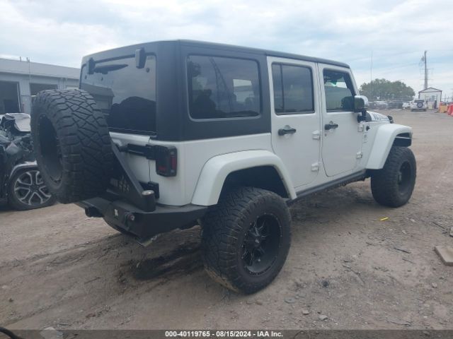 1C4BJWDG8EL307762 Jeep Wrangler Unlimited Sport