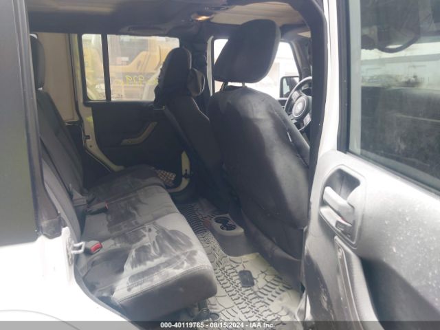 1C4BJWDG8EL307762 Jeep Wrangler Unlimited Sport