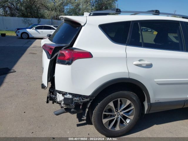 JTMRJREV2JD243705 Toyota Rav4 Hybrid Xle