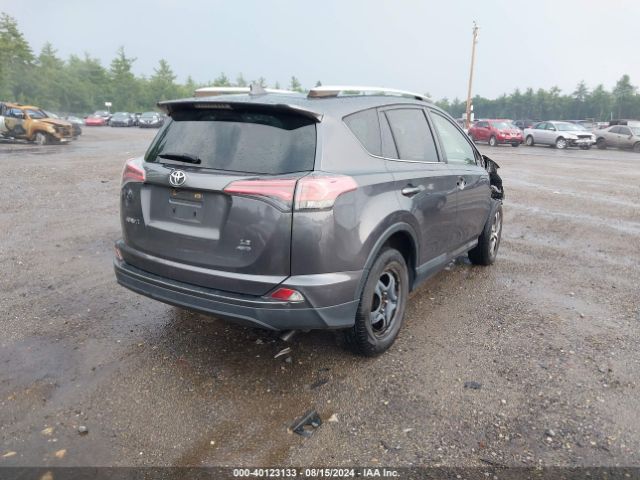 JTMBFREV8GJ070513 Toyota RAV4 LE