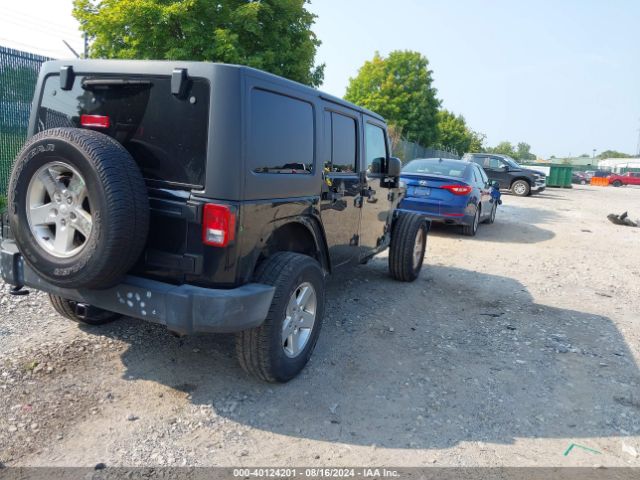 1C4BJWDG5GL202096 Jeep Wrangler Unlimited Sport