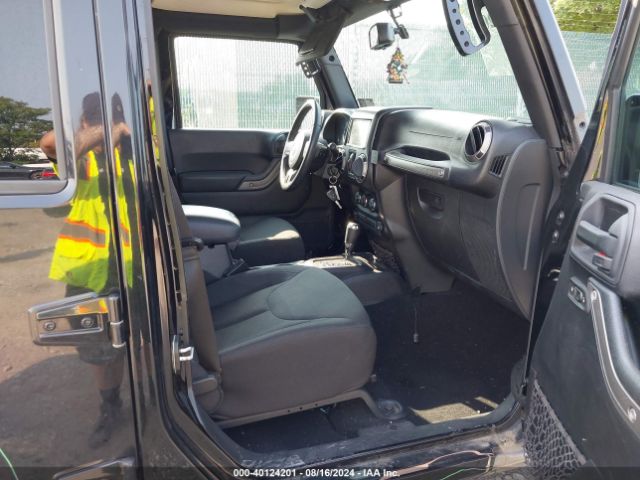 1C4BJWDG5GL202096 Jeep Wrangler Unlimited Sport
