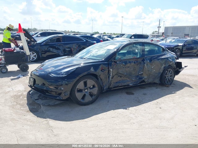 2023 TESLA MODEL 3 5YJ3E1EA7PF453145 Photo 1