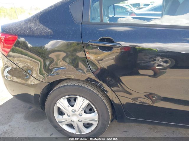 KNADM4A38F6485058 KIA RIO LX