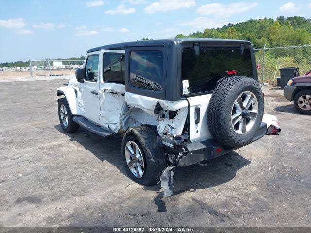 1C4HJXEG4KW577144 Jeep Wrangler Unlimited Sahara 4x4