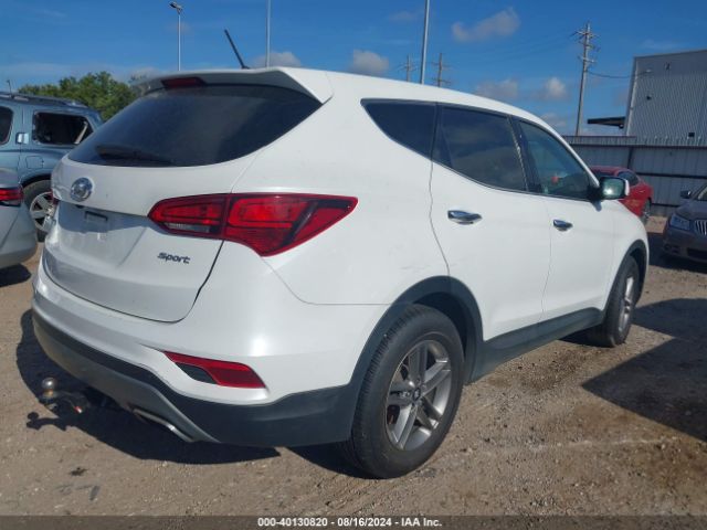 5NMZT3LB7JH077902 Hyundai Santa Fe Sport 2.4l