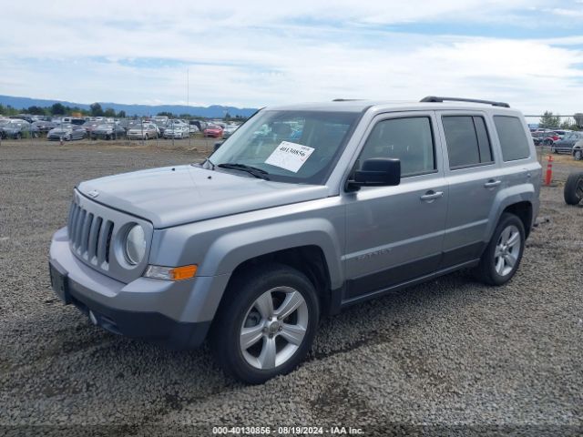 1C4NJPFB0FD297700 Jeep Patriot Latitude