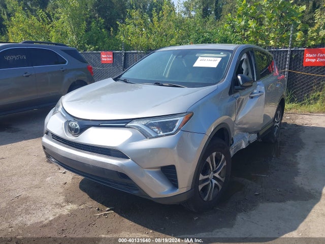 JTMZFREV3JJ161811 Toyota RAV4 LE