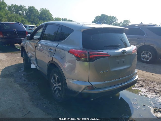 JTMZFREV3JJ161811 Toyota RAV4 LE