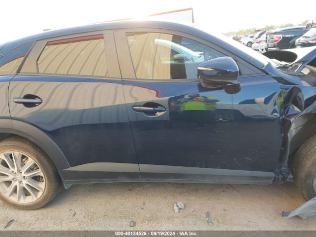 JM1DKDC71J0314057 Mazda Cx-3 Touring