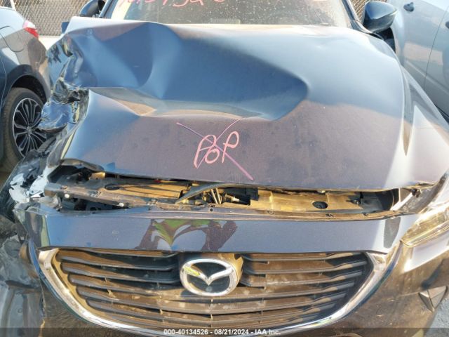JM1DKDC71J0314057 Mazda Cx-3 Touring