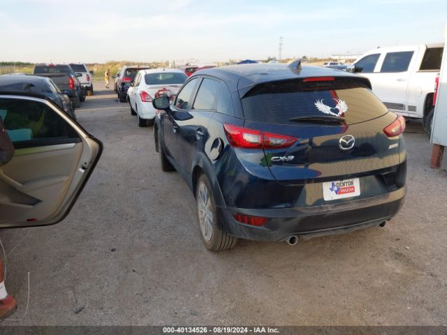 JM1DKDC71J0314057 Mazda Cx-3 Touring