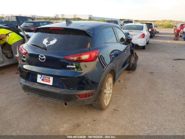 JM1DKDC71J0314057 Mazda Cx-3 Touring