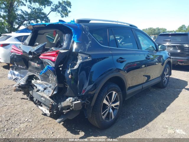 JTMRFREV2HD208318 Toyota Rav4 Xle