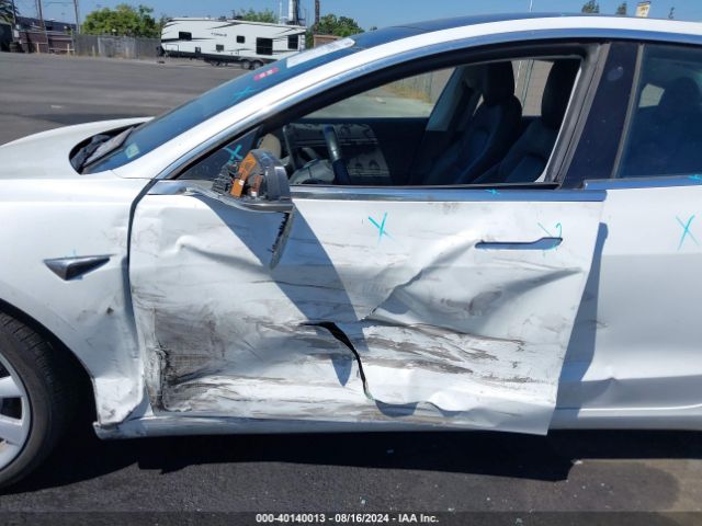 5YJ3E1EB6JF067719 Tesla Model 3 Long Range/performance
