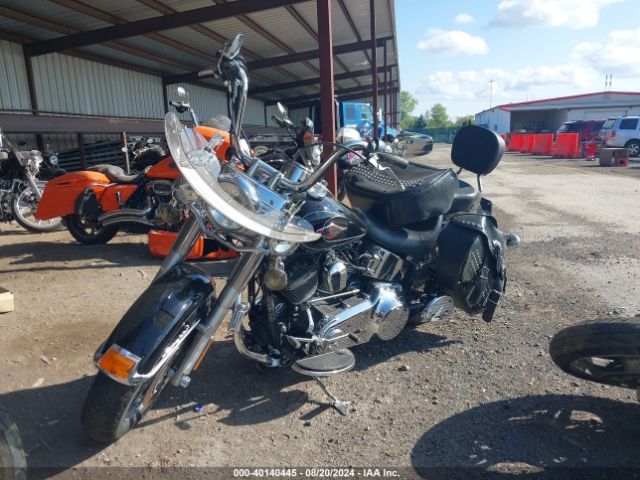2010 HARLEY-DAVIDSON FLSTC 1HD1BW515AB035530 Photo 1