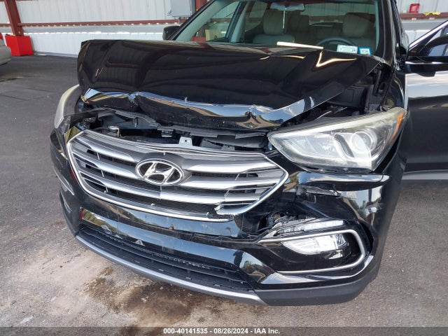 5NMZUDLB9HH031727 Hyundai Santa Fe Sport 2.4l