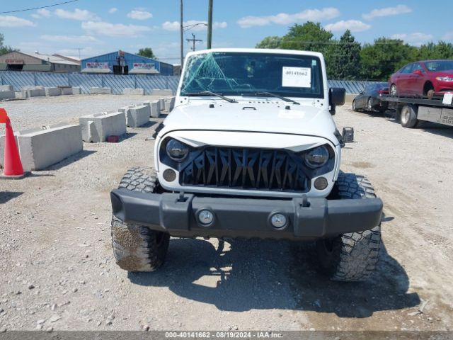 1C4BJWDG9EL269524 Jeep Wrangler Unlimited Sport