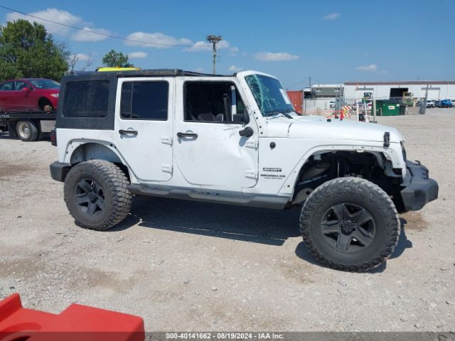 1C4BJWDG9EL269524 Jeep Wrangler Unlimited Sport
