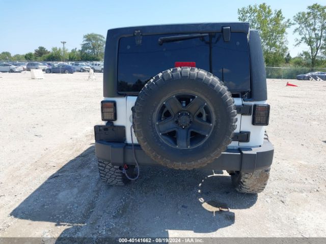1C4BJWDG9EL269524 Jeep Wrangler Unlimited Sport