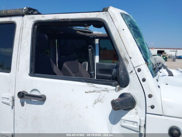 1C4BJWDG9EL269524 Jeep Wrangler Unlimited Sport
