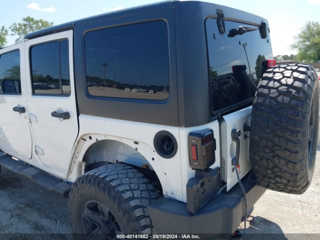 1C4BJWDG9EL269524 Jeep Wrangler Unlimited Sport