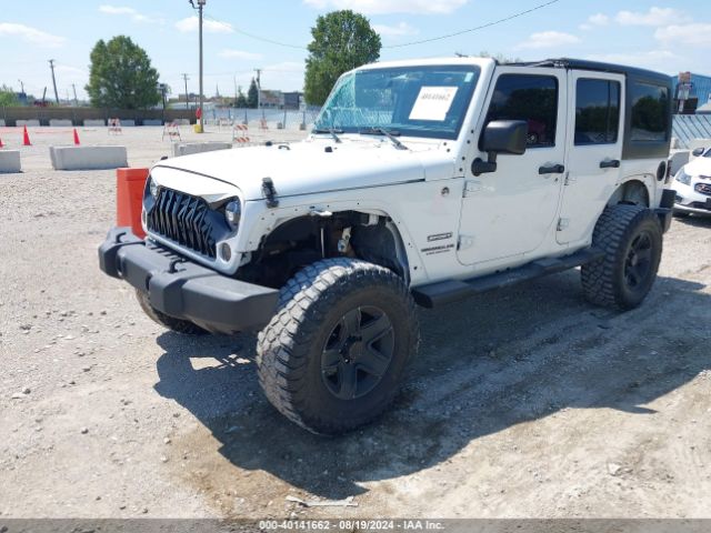 1C4BJWDG9EL269524 Jeep Wrangler Unlimited Sport