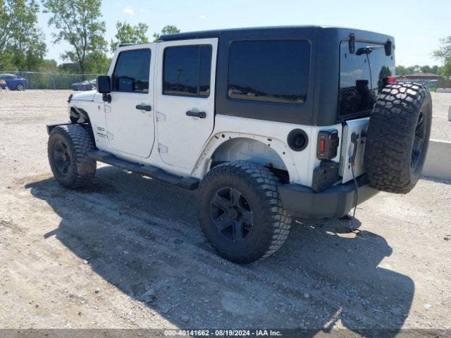 1C4BJWDG9EL269524 Jeep Wrangler Unlimited Sport