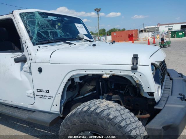 1C4BJWDG9EL269524 Jeep Wrangler Unlimited Sport