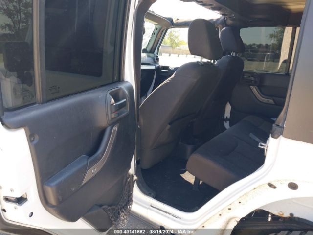 1C4BJWDG9EL269524 Jeep Wrangler Unlimited Sport