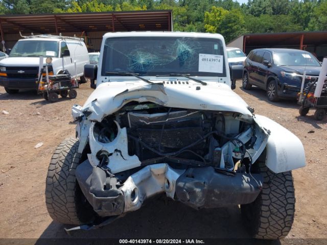 1C4HJWEG9FL767667 Jeep Wrangler Unlimited Sahara