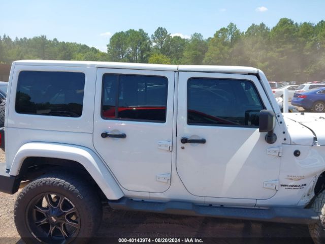 1C4HJWEG9FL767667 Jeep Wrangler Unlimited Sahara