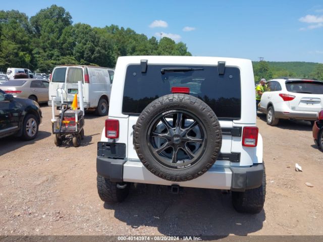 1C4HJWEG9FL767667 Jeep Wrangler Unlimited Sahara
