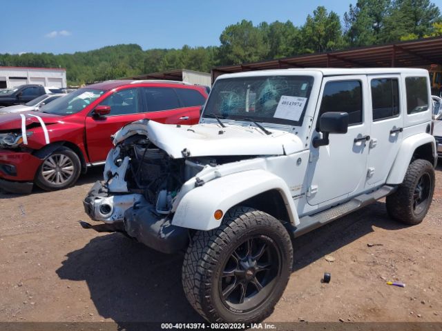 1C4HJWEG9FL767667 Jeep Wrangler Unlimited Sahara