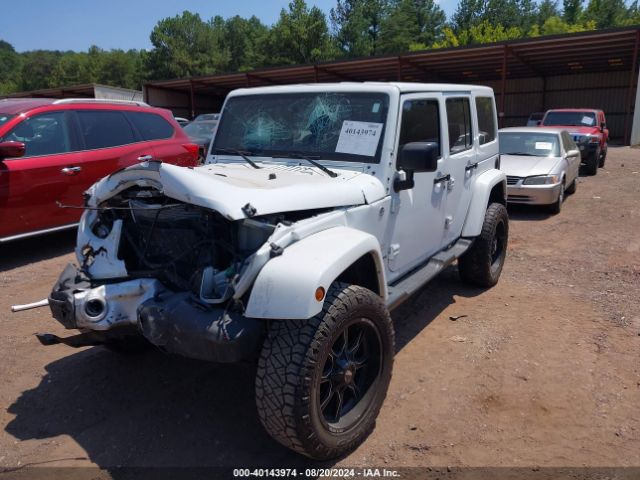 1C4HJWEG9FL767667 Jeep Wrangler Unlimited Sahara
