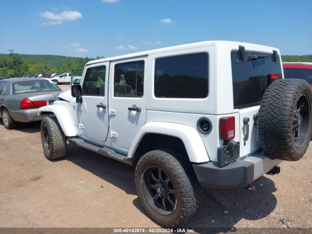 1C4HJWEG9FL767667 Jeep Wrangler Unlimited Sahara