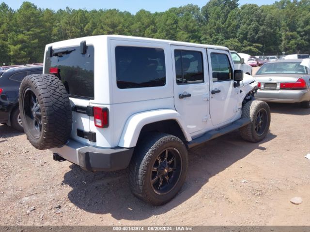 1C4HJWEG9FL767667 Jeep Wrangler Unlimited Sahara