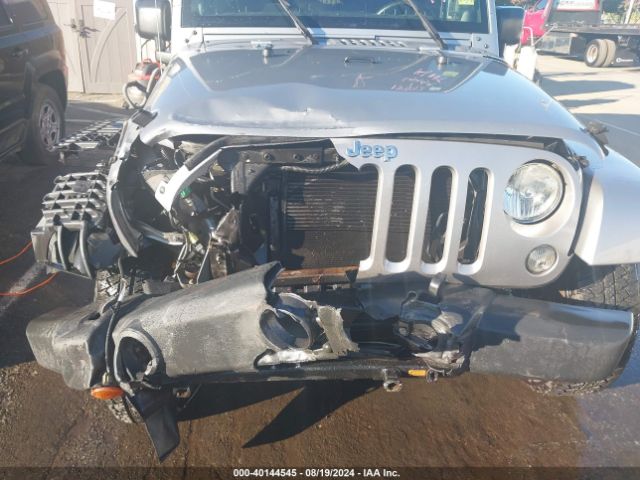 1C4BJWEG6EL254459 Jeep Wrangler Unlimited Sahara