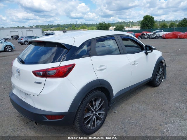 JM1DKFC7XH0169056 Mazda Cx-3 Touring