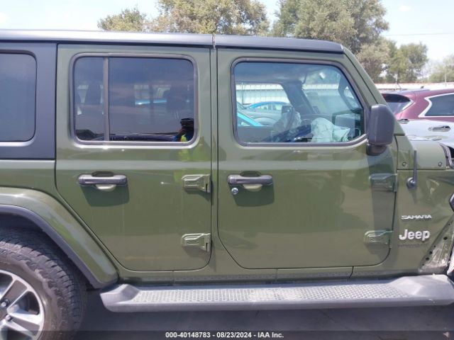 1C4HJXENXMW548877 Jeep Wrangler Unlimited Sahara 4x4