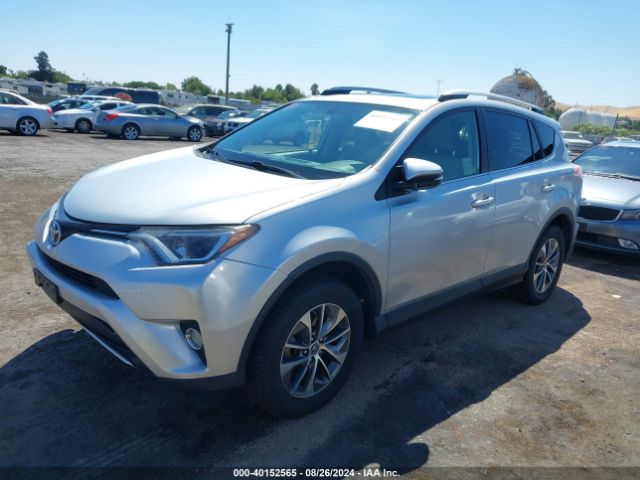 JTMRJREV4GD033437 Toyota Rav4 Hybrid Xle
