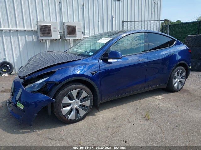 2023 TESLA MODEL Y 7SAYGDEE1PF801674 Photo 1