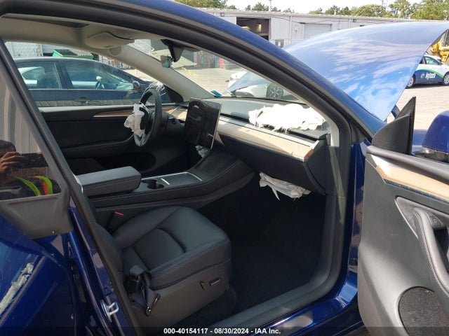 2023 TESLA MODEL Y 7SAYGDEE1PF801674 Photo 4