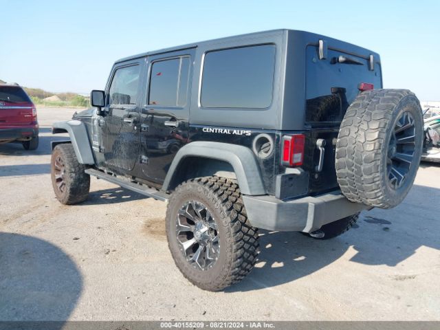 1C4BJWDG0FL581295 Jeep Wrangler Unlimited Sport